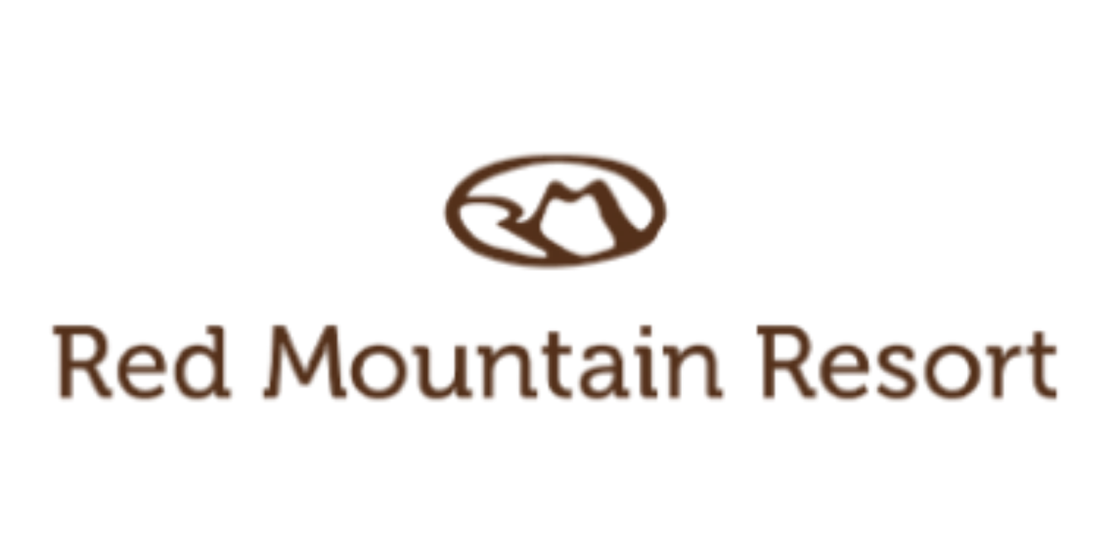 Logo for Red Mountain Resort with a mountain icon above the text.